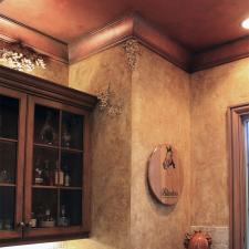 Faux Décor’s sculpted grapes and Tuscany plastered walls and faux copper ceiling for this Brentwood customer’s wine room